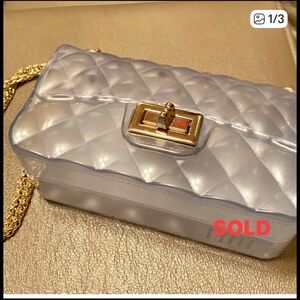 Quilted Jelly Crossbody Semi Clear Shoulder Bag With Gold Chain.